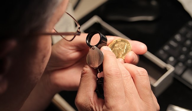 Examine coins yourself to gauge its condition and grade